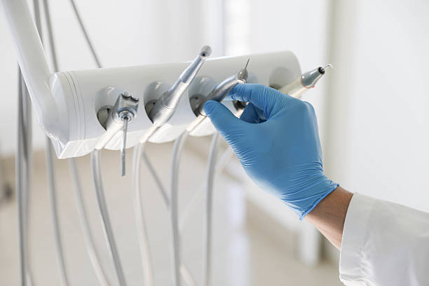 Professional Tooth Extraction technician working in Louisa, VA